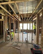 Construction site showing two workers